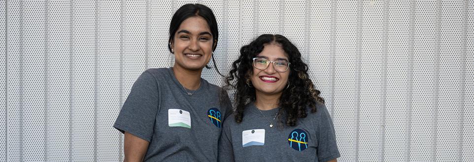 Two mentors smiling